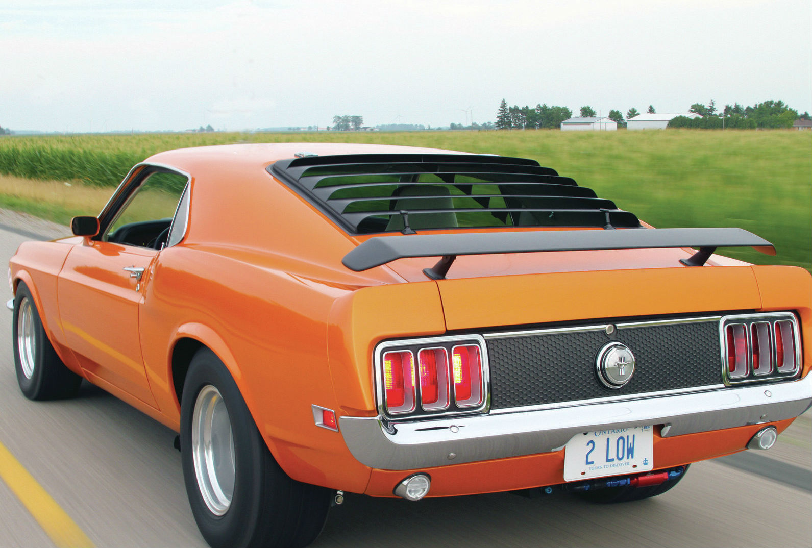1970-ford-mustang-mach-1-rear-side-view - Muscle Cars Zone!