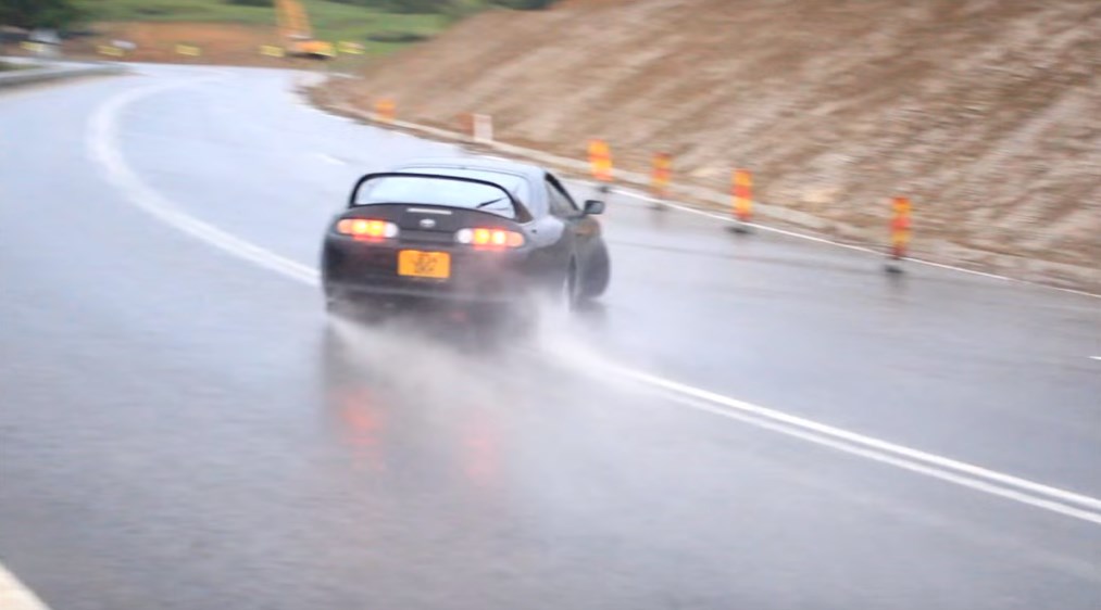 Drifting a Toyota Supra on A Wet Road