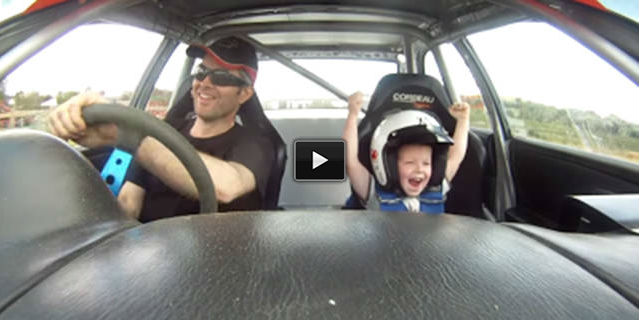 kid in Subaru Rally Car