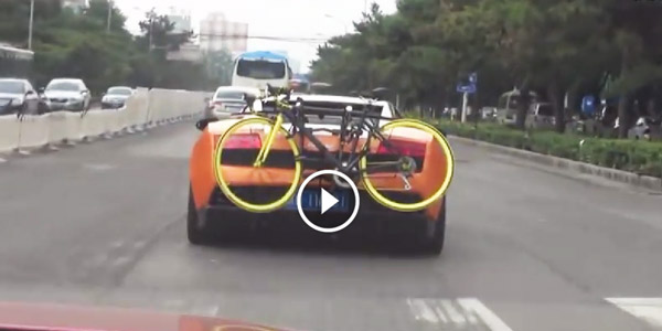 Lamborghini Family Car with the bike on the bumper