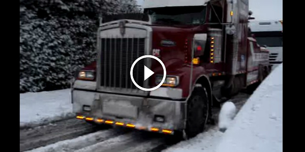Stuck In Snow And Need A Hand This Big Rig Truck Can Pull 18 Wheeler Uphill Like Nothing! 2