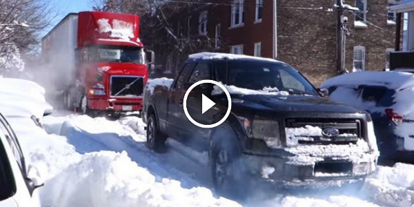 The power of FORD!!! Ford F 150 fx4 Tows a Semi Truck that is STUCK IN SNOW! VERY IMPRESSIVE!