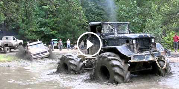 bobbed 5 Ton ARMY TRUCK pulling out ford with tractor tires