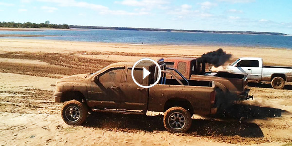 SAND RACE Cummins vs powerstroke mud drag racing