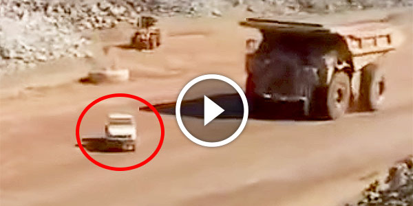 CAT 797B Mining TRUCK SMASHES A LANDCRUISER