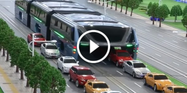 futuristic bus straddling bus 21
