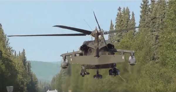 Black Hawk MEDEVAC Helicopter Lands middle Road 2