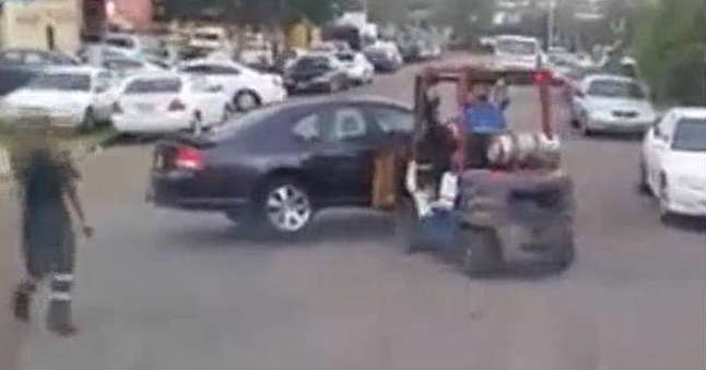 workers moved parked car forklift 2