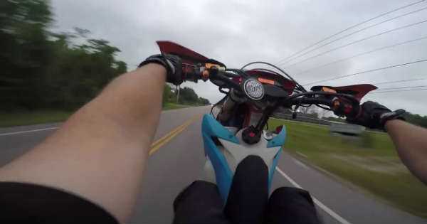 Biker Pulled Over Steps On Grass driver police gas tap 1