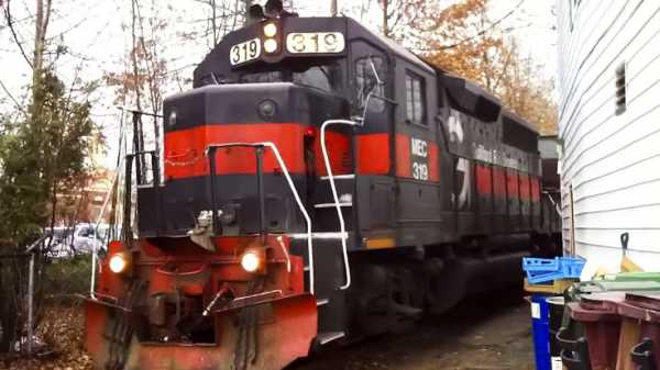 Huge Freight Train Gets Inside a Backyard 2
