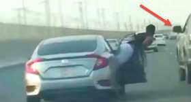 ROAD RAGE Can Cost You A Lot! MAN HANGS Out Of The Window To Hit Another Car 1