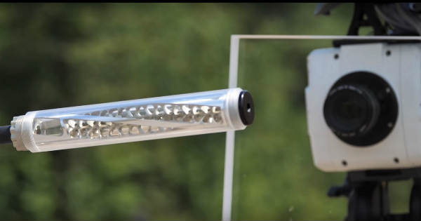 Super Slow Motion Video Of Shooting Through Suppressor 2