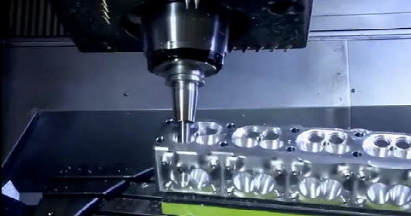 CNC Manufacturing Process Of An Engine Head 2