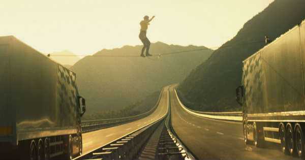 Faith Dickey Slackline Walk Between Trucks Volvo Commercial Crossing Slackline 11