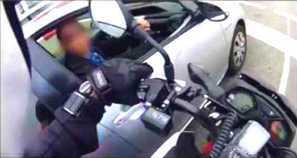 Undercover Cop on Motorcycle Is Pulling Over PHONE USERS 1